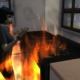 A house on fire in the Sims