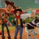 Woody and Buzz standing either side of the main character in Disney Dreamlight Valley.