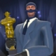 The Spy from Team Fortress 2 holding a Saxxy award.