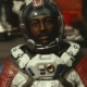 Starfield factions - A Constellation member in a red and white space suit and clear helmet.