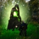 The Witcher 3 - Geralt kneels in front of a large stone glowing with the power of Axii