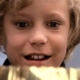 Charlie gazes at a golden ticket