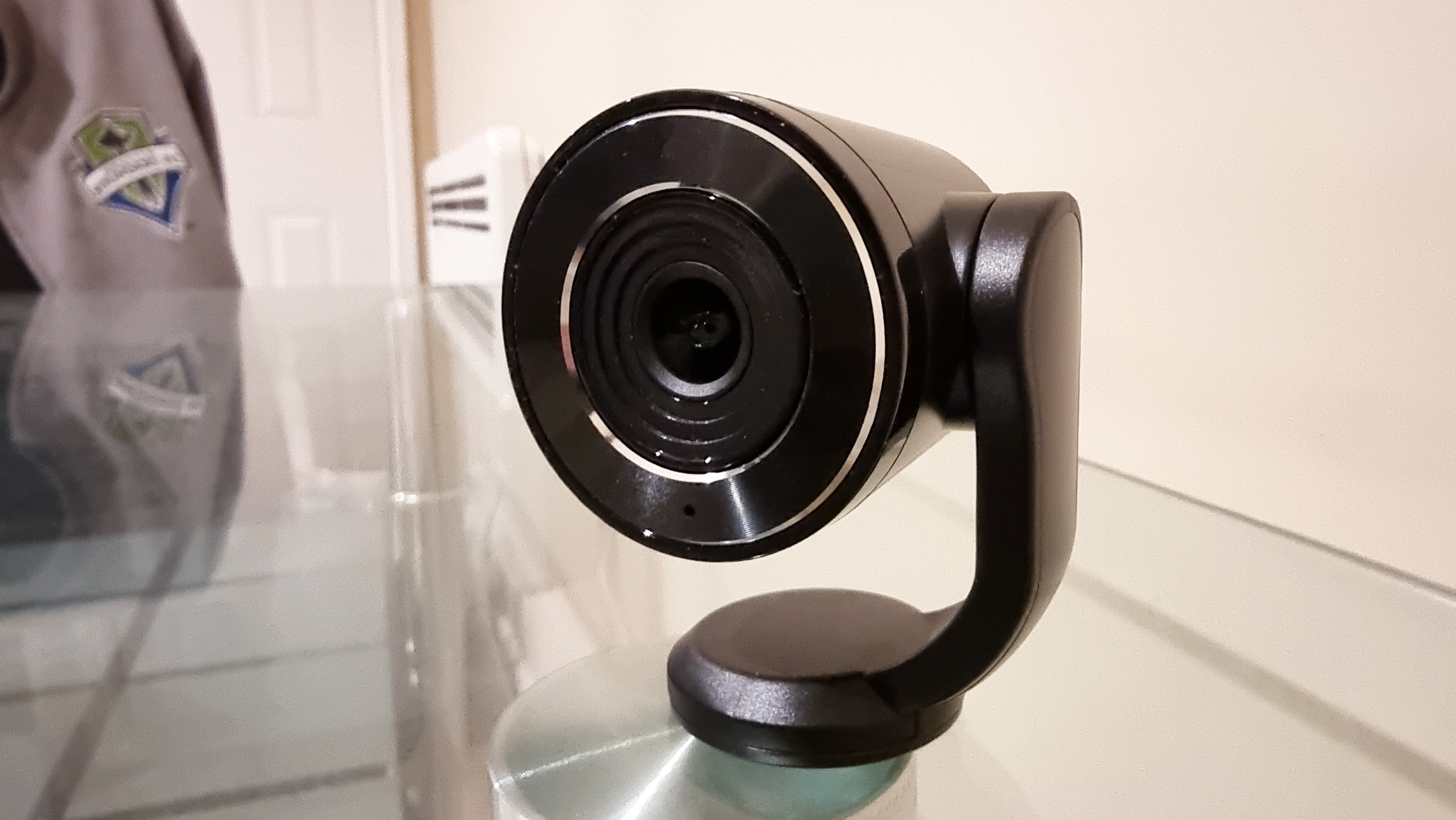 Toucan Pro Streaming Webcam from various angles on a desk.