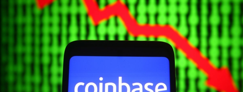 Coinbase logo with downward trend arrow.