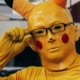 Man in terrifying pikachu costume.