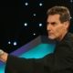 Uri Geller bending a spoon.