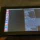 A close up of a Nintendo Switch running Linux with a list of Steam games to install, currently attempting to run FTL: Faster Than Light