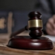 A gavel on a desk.