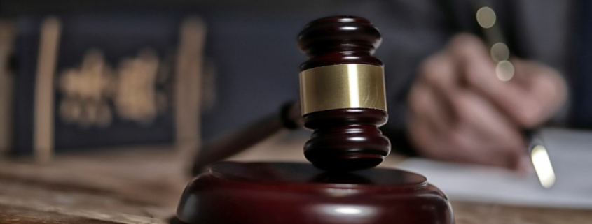 A gavel on a desk.