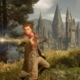 hogwarts legacy wizard casts a spell in front of hogwarts