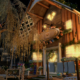 A small house lit up at night in Final Fantasy 14.