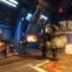 A mech-suited warrior battles a horde of aliens in Natural Selection 2.