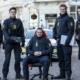 The Danish Police Online Patrol unit, standing in a line and holding gaming peripherals.