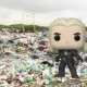 Geralt of Rivia Funko Pop superimposed over Mountain of rubbish and plastic bags, in the Dandora landfill in Nairobi, with marabu birds. High pollution and serious damage to the ecosystem. - stock photo by Enrico Tricoli via Getty Images