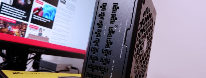 Corsair RMx SHIFT power supply being installed in a gaming PC