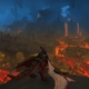 WoW 10.1 update - a shadow priest sitting on a dragonriding mount looks out over rivers of lava inside a huge cavern