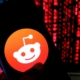 Reddit logo on mobile phone