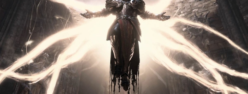 Diablo 4 — Inarius, the rogue Archangel, hovers in midair with tendril wings of light outstretched.