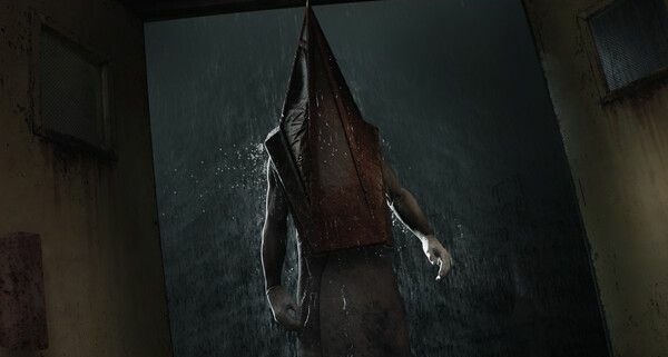 Pyramid Head stands in a doorway in Silent Hill 2.