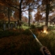 Sons of the Forest drying rack - a first-person viewpoint of someone holding a wooden spear looking towards a campsite with a drying rack and a small fire