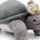 Another angle of the Turtle Pope, who is serene and chill and also a plushie.