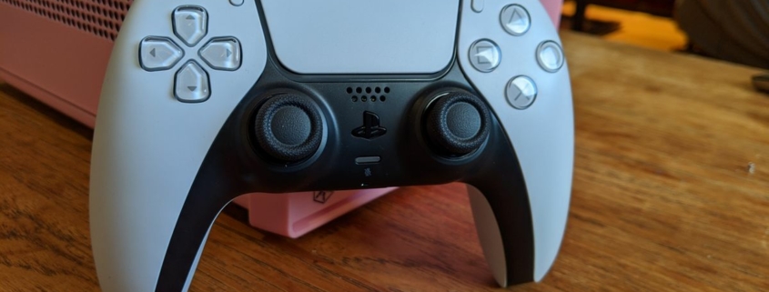 Image of the DualSense controller from the front on in situ.