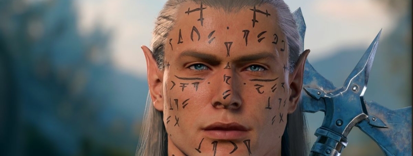 A close-up of an elf face with tattoos.