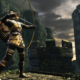 An archer in Dark Souls draws their bow to assail their enemy, perched atop castle battlements.