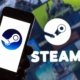 SPAIN - 2021/08/11: In this photo illustration, a Steam logo seen displayed on a smartphone and in the background. (Photo Illustration by Thiago Prudencio/SOPA Images/LightRocket via Getty Images)