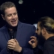 Geoff Keighley is interrupted by a stage crasher during Opening Night Live 2023.