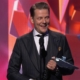 Photo of Remedy creative director Sam Lake accepting an award during The Game Awards 2023