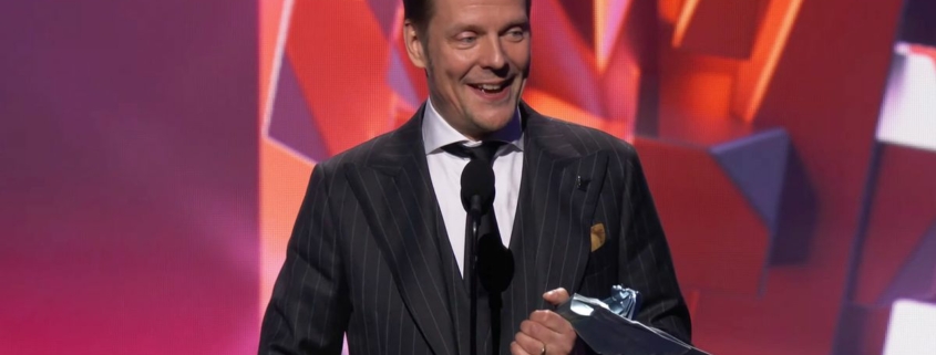 Photo of Remedy creative director Sam Lake accepting an award during The Game Awards 2023