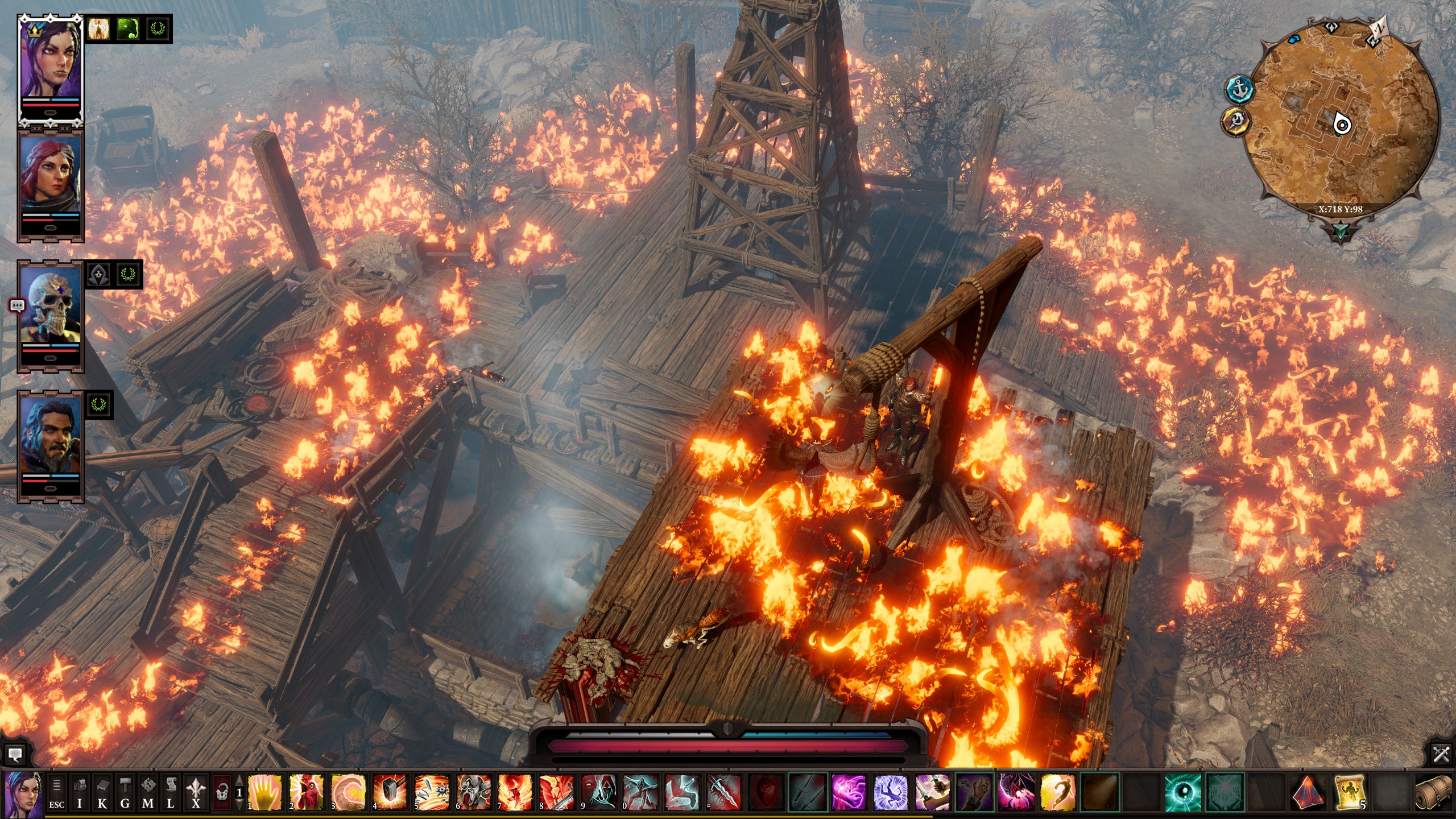 An aerial view of a combat encounter in Divinity: Original Sin 2, with most of the battlefield covered in fire.