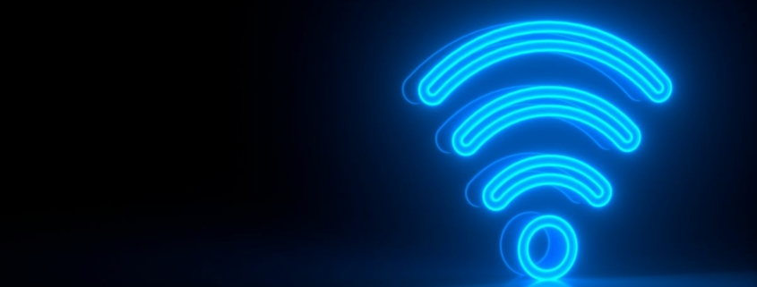 Futuristic glowing blue wi-fi symbol on black dark background with blurred reflection