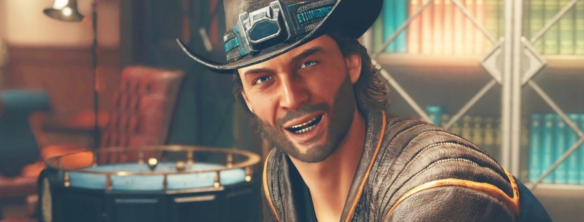 Close-up of man grinning with a cowboy hat