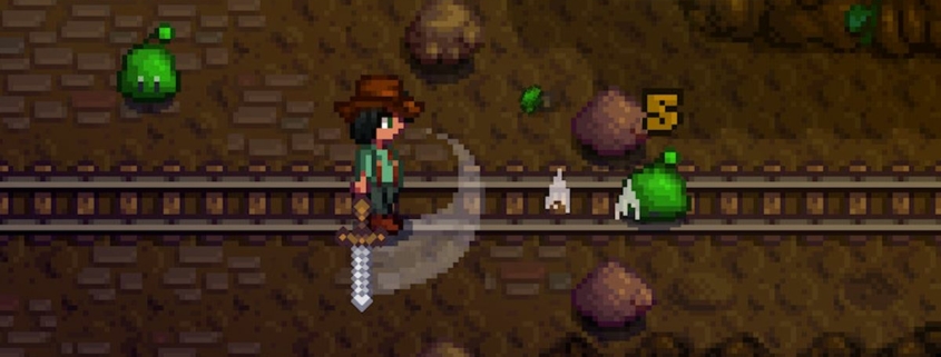 Stardew Valley screenshot - player swinging a sword in a fight against a monster in a mine