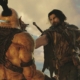 Talion thrusting a blade through the face of an orc