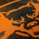 Teaser image from Xbox Games Showcase 2024 announcement - a three-headed dog laid overtop a US dollar bill, which is 100% teasing a new Black Ops game from Treyarch, you