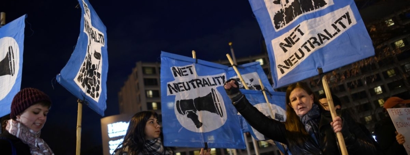 A small group of protestors supporting net neutrality protest against a plan by Federal Communications Commission (FCC) head Ajit Pai, during a protest on December 7, 2017 in Washington. Demonstrations in support of net neutrality are planned nation-wide at hundreds of Verizon stores and other venues. / AFP PHOTO / Andrew CABALLERO-REYNOLDS (Photo credit should read ANDREW CABALLERO-REYNOLDS/AFP via Getty Images)