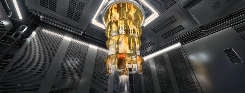 A photo of a quantum computer hanging from the ceiling of a clean room laboratory