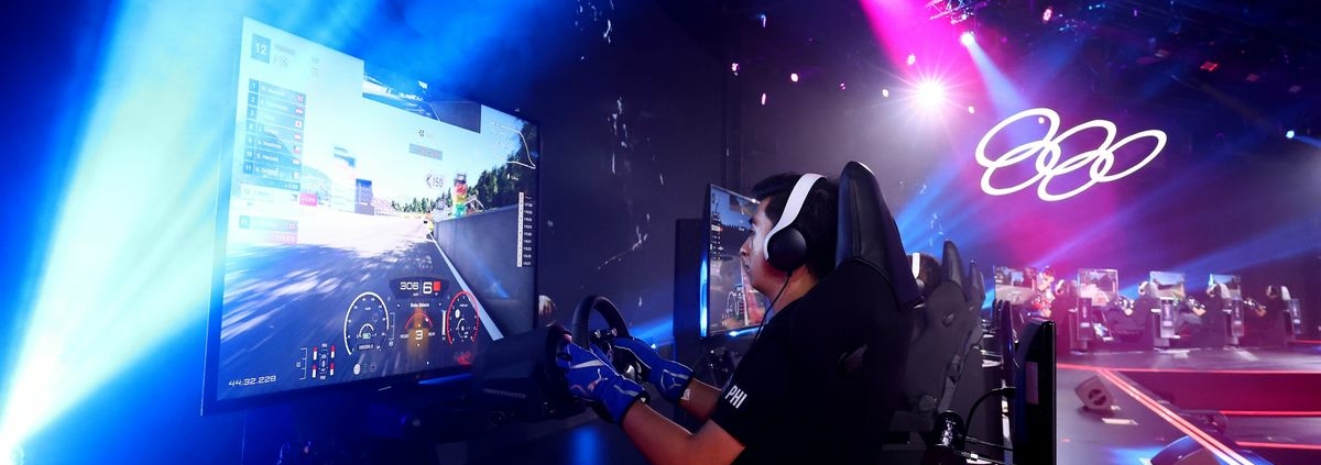 SINGAPORE, SINGAPORE - JUNE 25: Inigo Anton of Team Philippines competes in the Gran Turismo motor sport qualifying rounds on day four of the Olympic Esports Week at Suntec Singapore Convention & Exhibition Centre on June 25, 2023 in Singapore. (Photo by Yong Teck Lim/Getty Images)