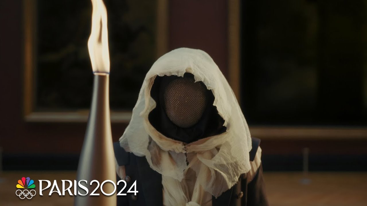 Was Arno from Assassinâs Creed the masked torchbearer at the Olympic Opening Ceremony? | Paris 2024 - YouTube