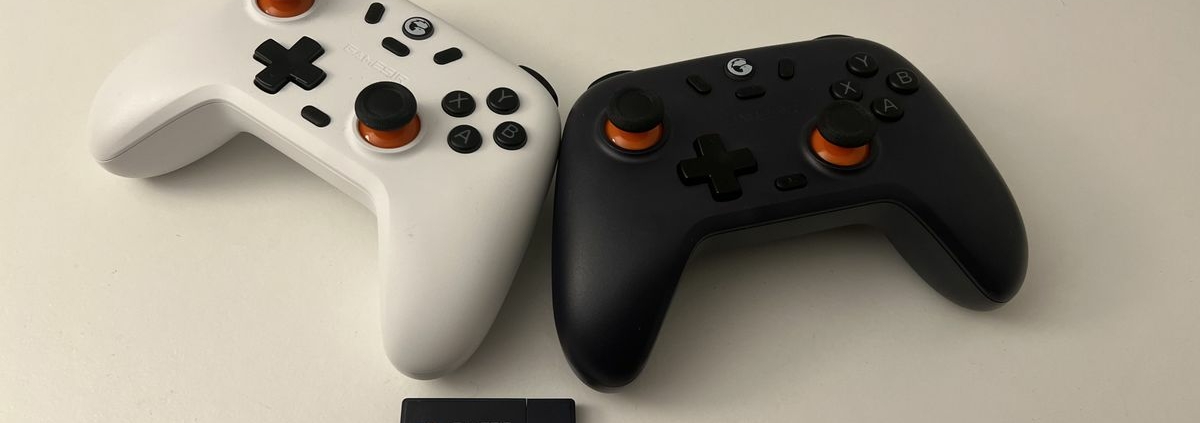 Two GameSir Nova Lite controllers on a desk