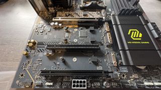 A photo showing the PCIe and M.2 slots on an MSI MAG X870 Tomahawk motherboard