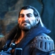 Dragon Age character Varric looking confidently forward with allies behind him