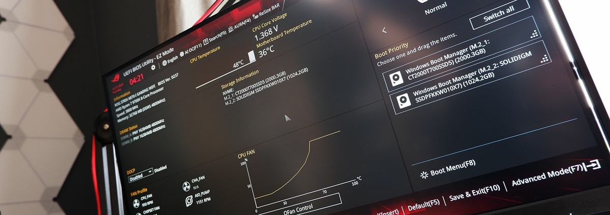 A photo of a gaming monitor displaying the new Asus BIOS page in 1080p.