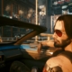 Johnny Silverhand riding shotgun in Cyberpunk 2077