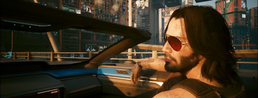 Johnny Silverhand riding shotgun in Cyberpunk 2077