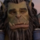 Orc man looking pensively at camera