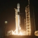 A SpaceX rocket being launched into space carrying a payload with the first datacentre for the moon.